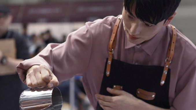 Hyun-young Bang pours a drink at a barista competition.