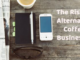 A picture of a desk with a white iphone sitting next to a notepad and a newspaper. A text title reads "The Rise of Alternative Coffee Businesses."