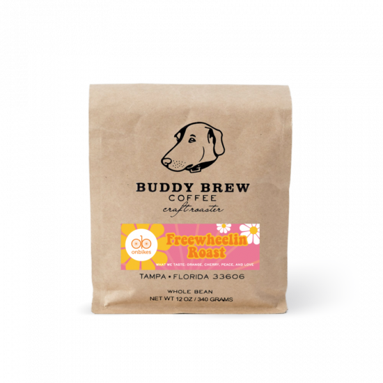 A brown coffee retail bag with a golden retriever stamped onto it. It is the freewheelin roast.