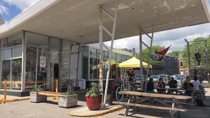 The exterior of a gas station turned into coffee shop by Tandem in Maine.