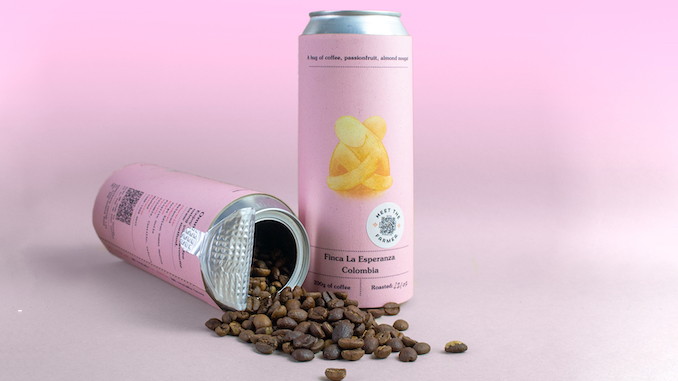 Two cans next to each other, one standing and the other spilled with coffee beans coming out of it. It is against a pink background.