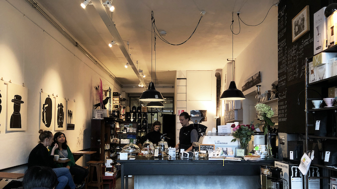 The inside of a sleek cafe in Rotterdam.