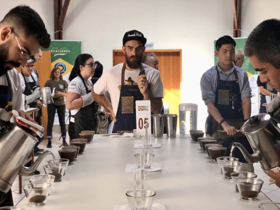 Nolan Hirte of Proud Mary judges at Cup of Excellence in Brazil.