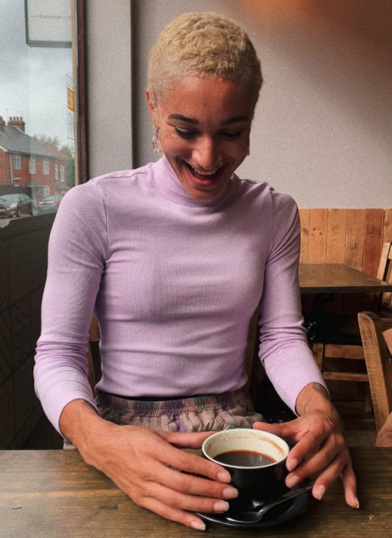 Jodie Williams enjoys a cup of coffee.