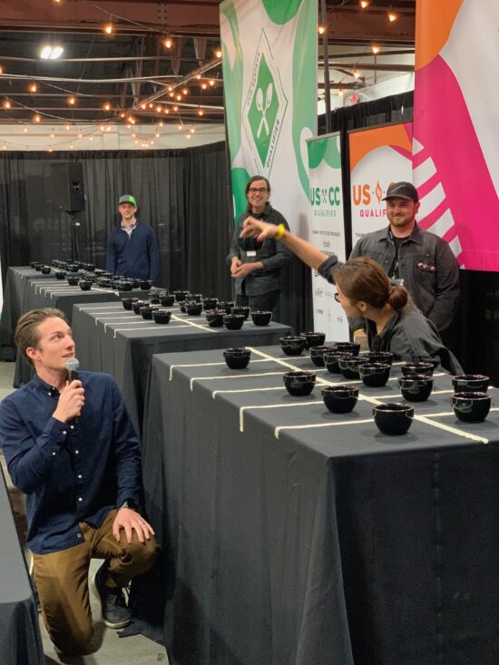Simeon Bricker emcees the Cup Tasters competition at the 2020 Nashville Qualifying event for the U.S. Coffee Championship.
