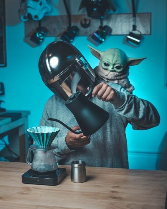 Baby Yoda from Star Wars helps pour coffee at Origen Tostadores de Café