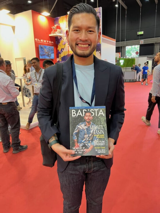 June + July 2022 Barista Magazine cover person Mikael Jasin at the 2022 World of Coffee.