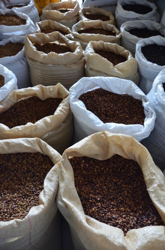 Sacks of honey processed coffee with different amounts of mucilage on the beans.