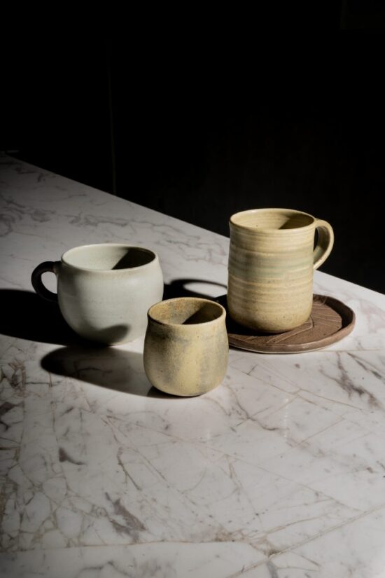 Three drinking vessels on a bar in Bad Café.