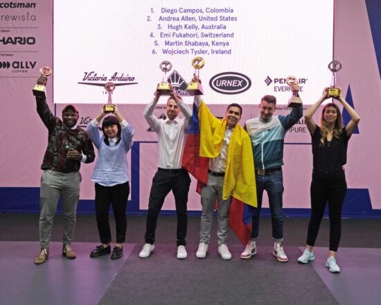 The 2021 World Barista Championship Finalists on a stage.