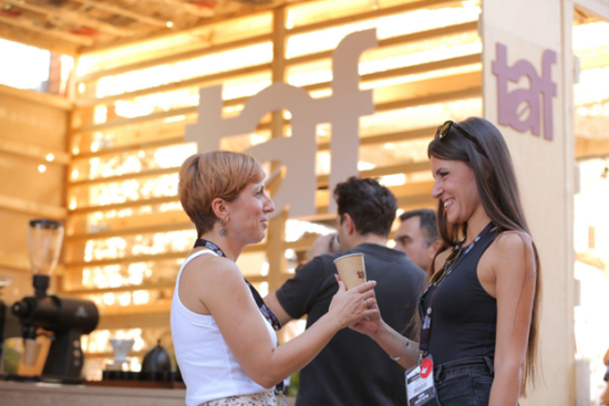 Attendees at the coffee festival sampling coffees.