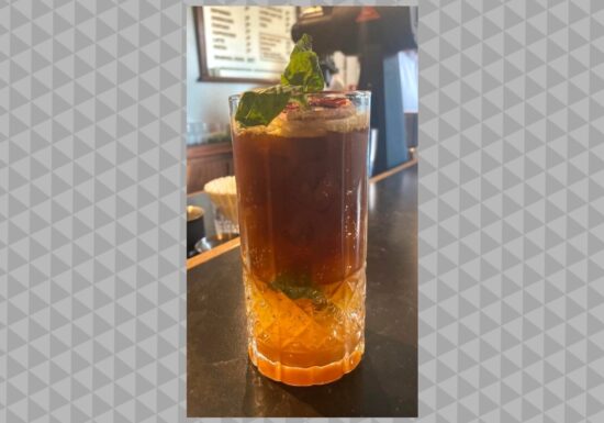 The Bloody Basil in a glass on a bar at Rowan Coffee in Asheville, N.C.