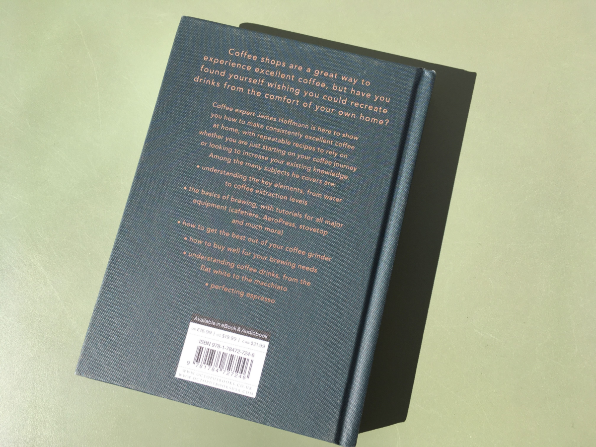 The back cover explains the purpose of the book and lists some topics covered. The cover is navy blue with gold lettering and a white and white bar code on the bottom.