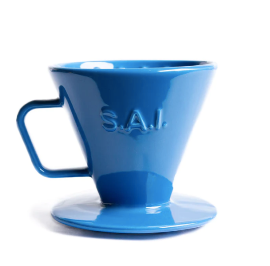 The C70 is all blue, a tall conical V shape, with a squared handle on the side and a wide flat bottom lip to help it stand on its own.
The letters S.A.I. are debossed on the side for Saint Anthony Industries, the makers of C70.