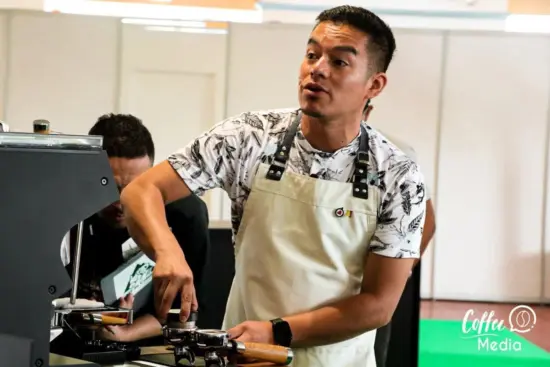 Cesar Augusto Velandia from Amor Perfecto in Colombia competes in a barista competition.