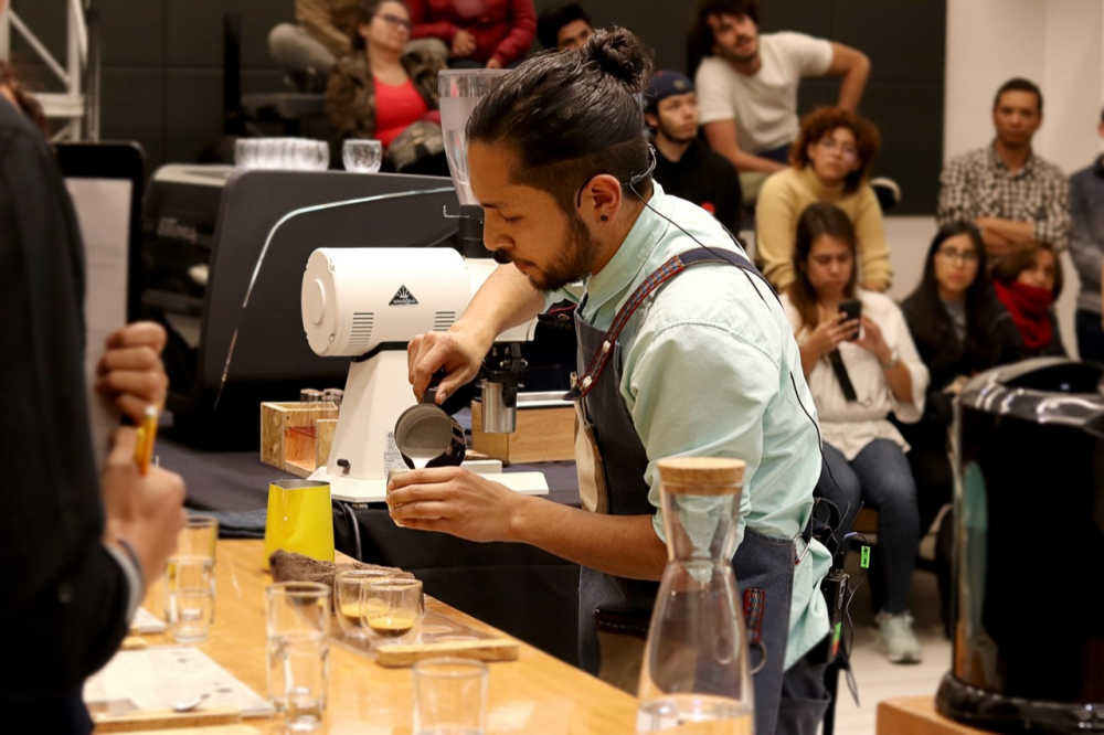 Jonathan Ramirez of Ecuador competes in a barista competition.