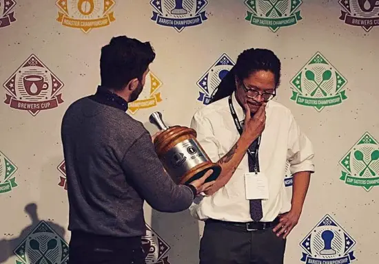 Charles Babinski hands a trophy to winner of 2016 winner of the USBC, Lem.