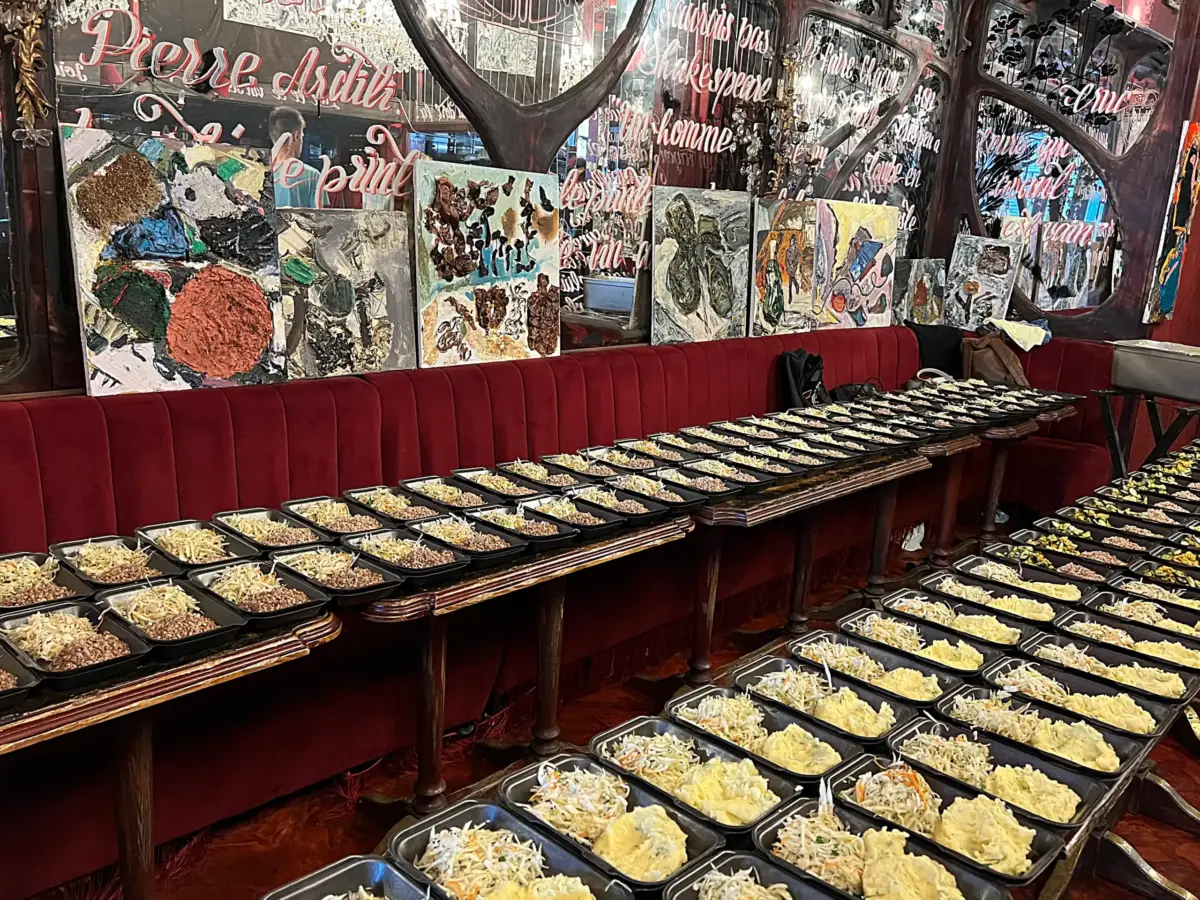 Lunches are lined up on tables to be donated to hospitals, the military, and first responders.