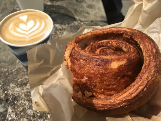 A small latte and a cinnamon bun from Bould Brothers.