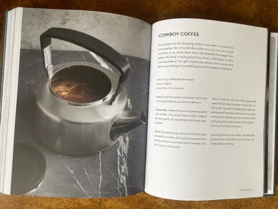 Inside the book, a recipe for cowboy coffee and a picture of a silver kettle.