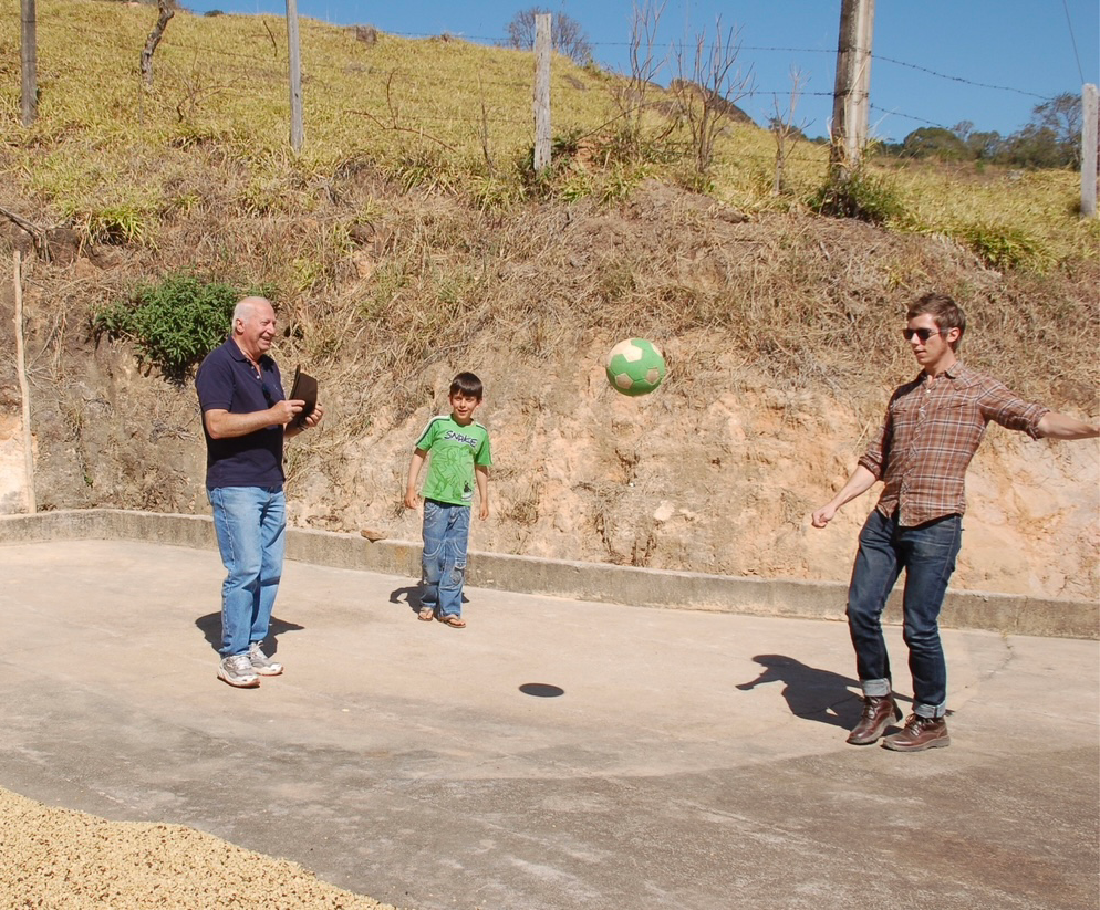 Gianni playing soccer with Michael Harwood in Brazil in 2011.