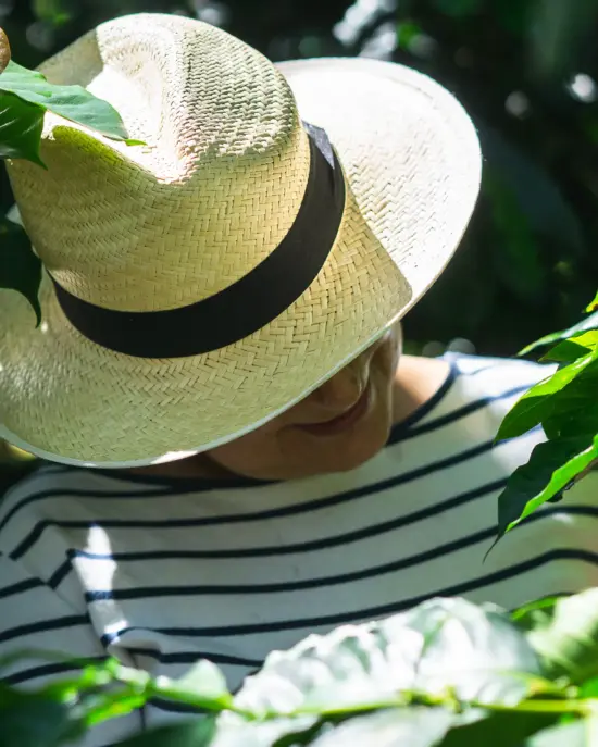 A woman in a straw hat.