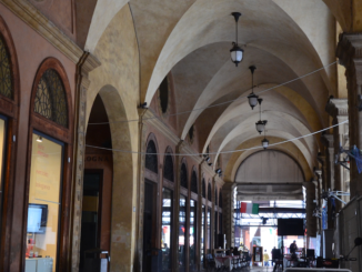 The porticos of Bologna with shops underneath.