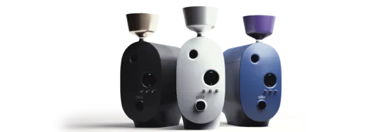 Three roasters (black, white, blue) from Aillio.