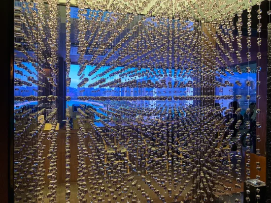 Hanging strings of glass or crystal in the entrance of a cafe.