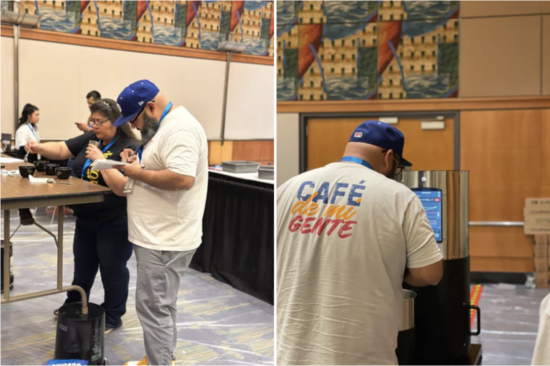 Eduardo taking notes and watching roast curves on a screen while roasting during the competition.